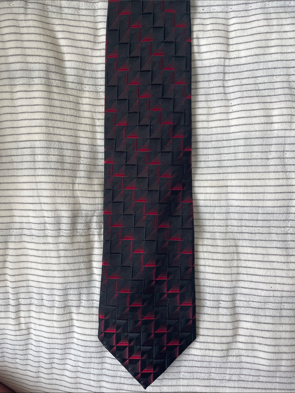 Classic Black Tie with Subtle Red Geometric Pattern